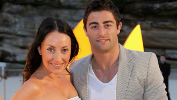Designer Terry Biviano with football player fiance Anthony Minichiello.