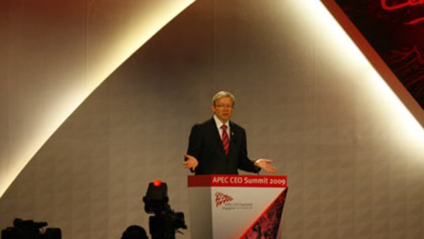Seeking solutions...Kevin Rudd at the APEC summit yesterday.