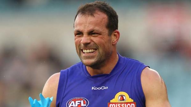 From grin to grimace: Brad Johnson feels the pain in round 19.