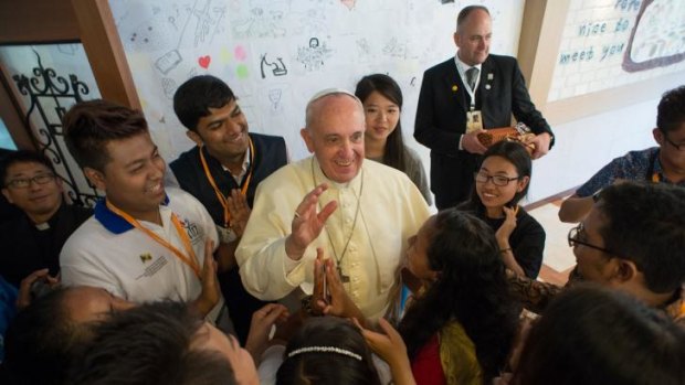 Pope Francis is welcomed by young people at the Major Seminary of Daejeon.