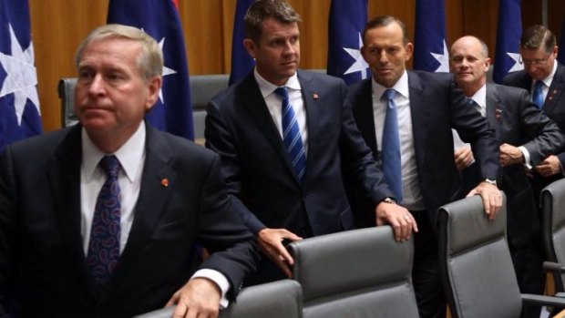 Pollies behaving badly: WA Premier Colin Barnett (far left) and Prime Minister Tony Abbott (middle).