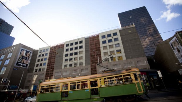 Two towers will replace the nine-storey car park on the La Trobe Street site.