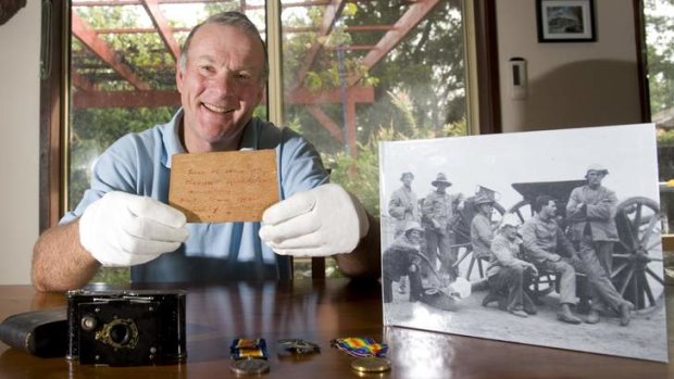 Historic relic: Bill Frost with a piece of the Red Baron's plane recovered by his great grandfather along with images he took during WWI.