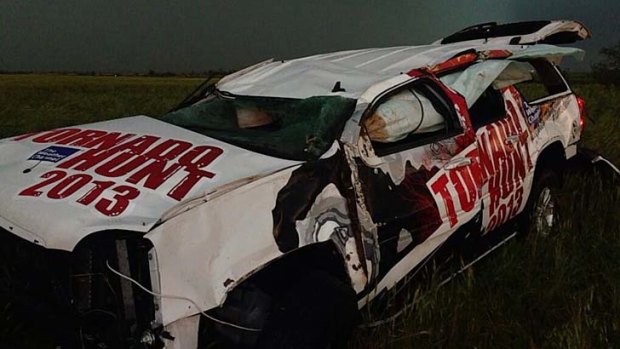 Storm power: The Weather Channel's Mike Bettes and his team were in this vehicle which was hurled an estimated 180 metres.