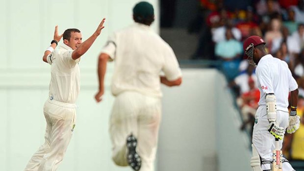 Late breakthrough ... Peter Siddle celebrates dismissing West Indies batsman Kraigg Brathwaite.