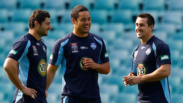 The Blues' Anthony Minichiello, Jarryd Hayne and Mitchell Pearce share a joke at training.