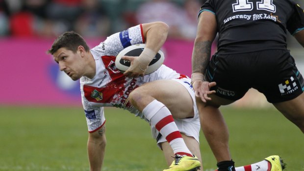Stumbling: St George Illawarra five-eighth Gareth Widdop tries to get back to his feet against Penrith.