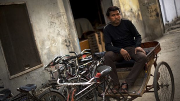 Mohammad Salim, whose kidney was stolen, can only manage a few hours a day as a bicycle rickshaw driver.