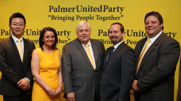 Clive Palmer with his MPs and ally Ricky Muir in 2013, when he spent millions to get them elected.