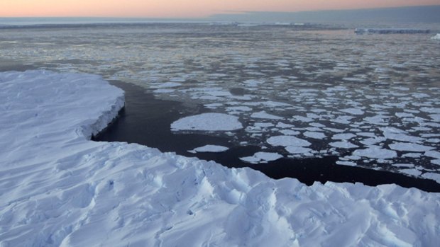 Melting icebergs ... a symptom of global warming.