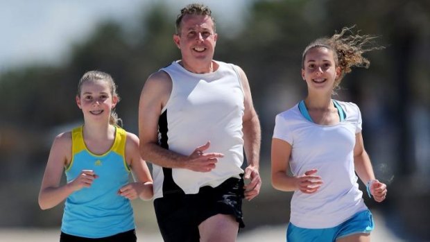 Niamh and Ciara Boyd-Squires Long run with their father Chris Long.