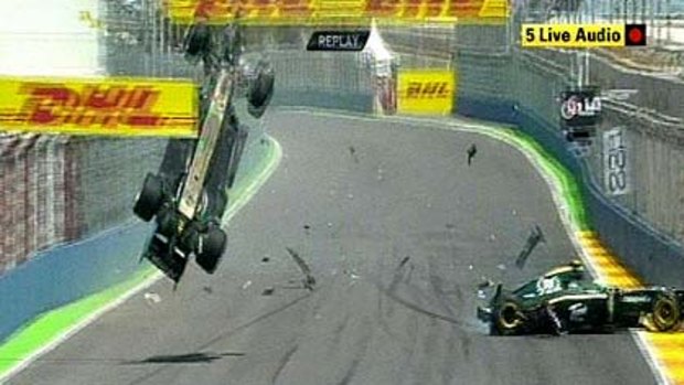 Airborne and spinning ...  a video image released by the BBC shows Red Bull's Mark Webber, left, after crashing into the back of Heikki Kovalainen's Lotus.
