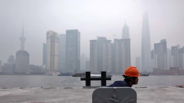 Is the great Chinese crash coming? ... a labourer works at a construction site in Shanghai.