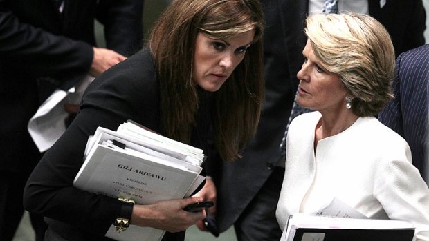 'Gillard' file ... Opposition Leader Tony Abbott's chief of staff Peta Credlin, left, speaks with Deputy Opposition Leader Julie Bishop at the end Question Time on Monday.