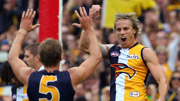 Mark Nicoski celebrates a goal during the Eagles' derby win at Subiaco Oval.