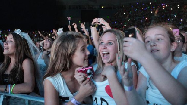 Delirious teenagers squeal their delight during the concert at Hisense Area last night of British boy band One Direction.