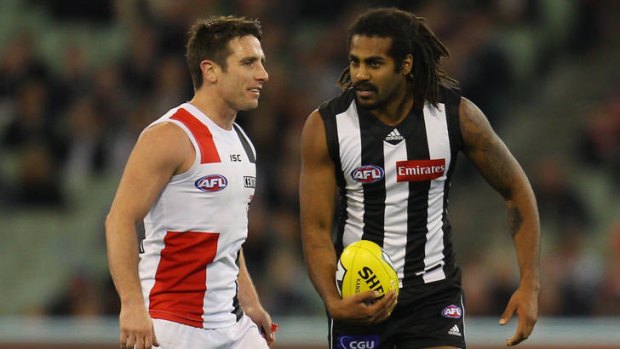 Hot water: St Kilda's Stephen Milne with Harry O'Brien.