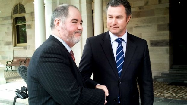 Deal ... Kevin Bates of the Queensland Teachers' Union and Education Minister John-Paul Langbroek welcome the teacher pay deal.