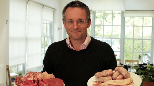 Michael Mosley in his home with a plate of red meat and processed red meat Michael Mosley: Should I Eat Meat? on SBS One. Image supplied by SBS publicity.