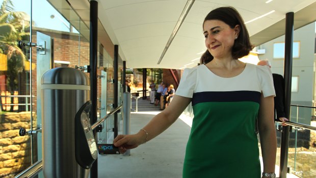 Fan: NSW Transport Minister Gladys Berejiklian taps on.