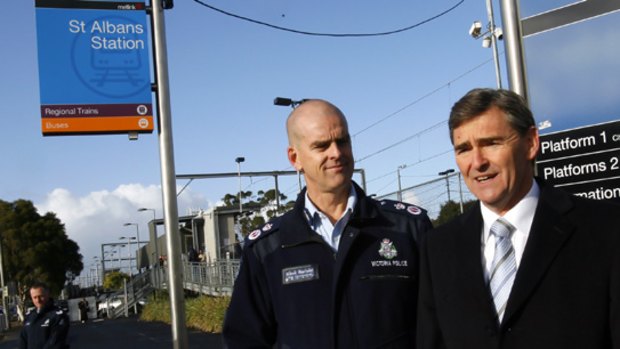 Premier John Brumby and Police Commissioner Simon Overland at St Albans railway station.