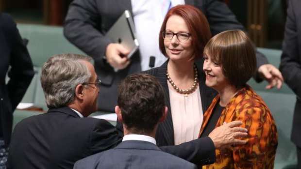 Treasurer Wayne Swan with Prime Minister Julia Gillard and Nicola Roxon after she delivered her valedictory speech on Tuesday.