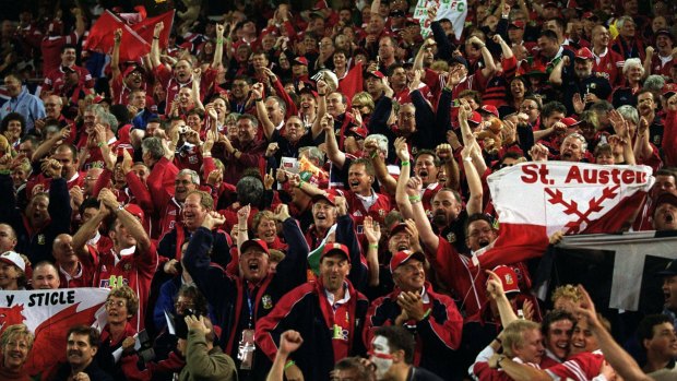 Red then yellow: Lions fans turned Brisbane red in 2001, but the stadiums quickly turned gold after the first Test.