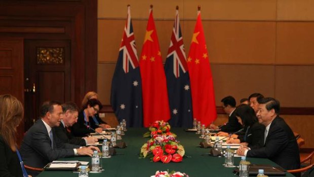 Prime Minister Tony Abbott meets with Chinese President Xi Jinping during the APEC Leaders' Meeting, in Bali.