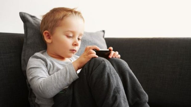 Divided attention: When parents are with their children and on mobile devices, they're not always "present" to their child's needs.