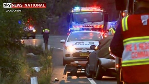 A single-vehicle accident killed two men, closing two lanes of the Pacific Motorway early on Boxing Day.