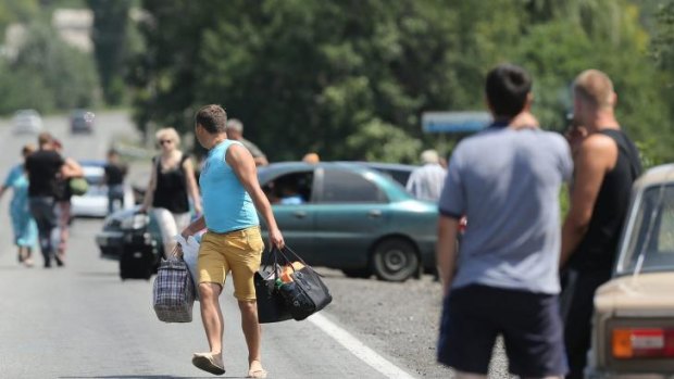 Residents fleeing from Shakhtersk.