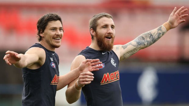 The dumped Nick Duigan, left,  and Zac Tuohy find time for a laugh at a Carlton training session on Friday.