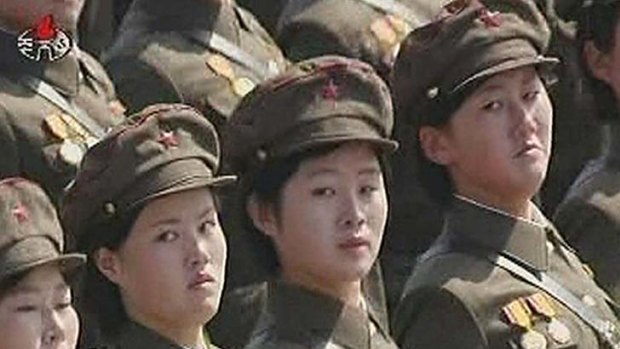 Female North Korean soldiers take part in a mass parade to celebrate founder Kim Il-sung's 100th birthday.