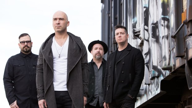 Lead singer Ed Kowalczyk (second from left) says that since Live got back together they are possibly playing better than before. 
