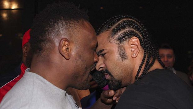 Fight ... Dereck Chisora, left, and David Haye confront each other.