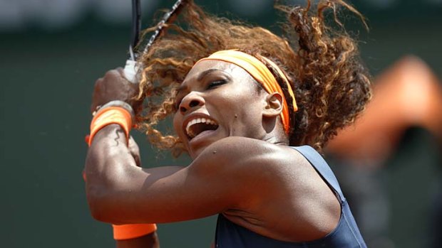 Serena Williams hits a return to Italy's Roberta Vinci.