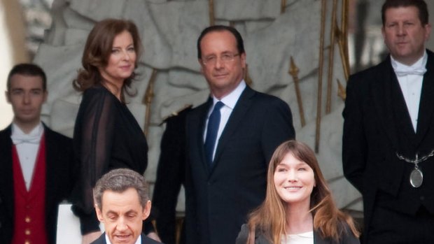 Nicolas Sarkozy and Carla Bruni leave the Elysee Palace after Francois Hollande was sworn in as President.