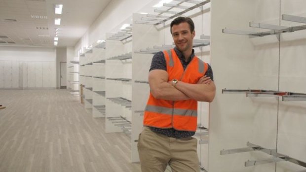 Myer ambassador Kris Smith in the menswear department (with no menswear).