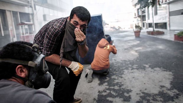 UNrest: Demonstrators in Taksim Square on Tuesday clashed with riot police, who fired tear gas and rubber bullets at firework-hurling demonstrators.