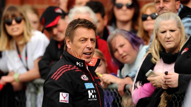 Essendon's Mark Thompson with fans at training last week.