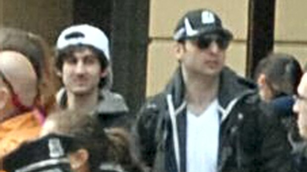 Boston Marathon bombers Dzhokhar (left) and Tamerlan Tsarnaev just before their pressure-cooker bombs went off on April 15, 2013.