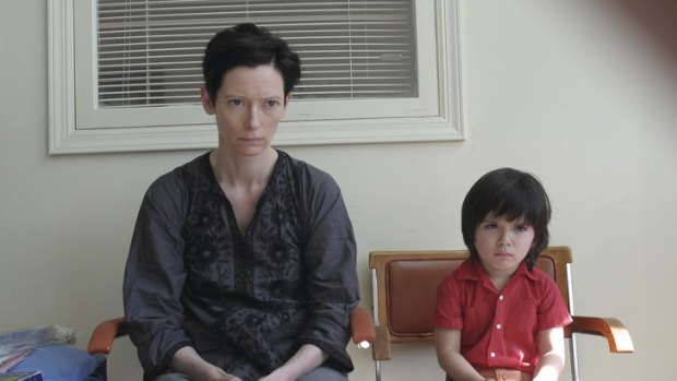 Tilda Swinton and Jasper Newell play not-so happy families in the award-winning film version of <i>We Need to Talk About Kevin</i>.