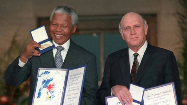 Then South African deputy president F.W. de Klerk, right, and president Nelson Mandela  with their Nobel Peace Prize gold medals and diplomas, in Oslo, on December 10, 1993.