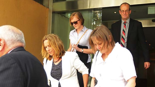 The family of Alec Meikle, sister Rebecca, third from left, mother Andrea, second from right, and father Richard Meikle, right, leave court.