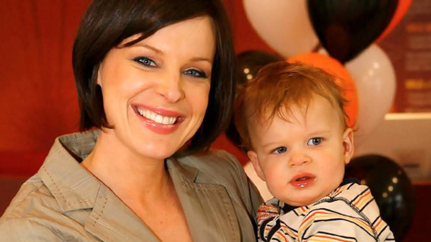 Good age to conceive ... 33-year-old newsreader Natasha Belling is mother to Harrison, pictured, and baby Hugo.