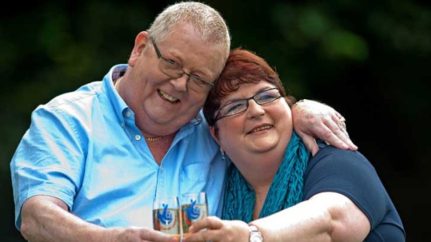 Colin and Chris Weir celebrate their EuroMillions lottery win.