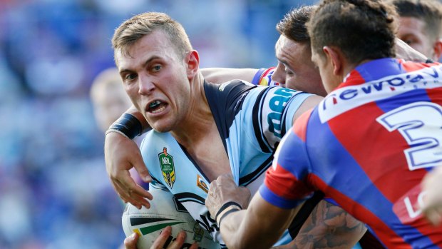 Handful: Cronulla's Kurt Capewell makes inroads on Sunday.