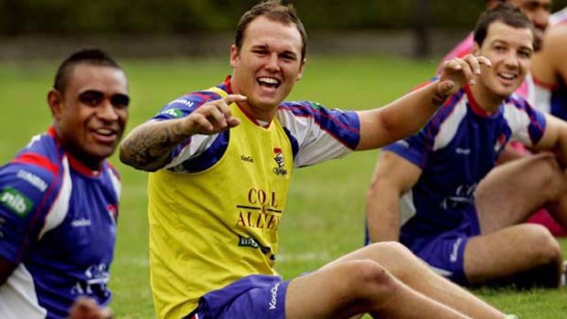 Showing no ill effects from Saturday night's incident, Cory Paterson shares a laugh with teammates at Knights training yesterday morning.