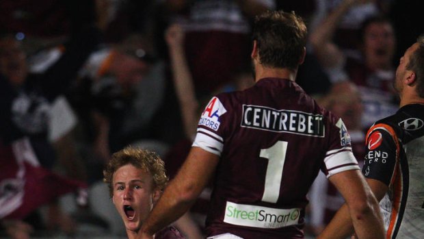 Second-half burst ... Daly Cherry-Evans of the Sea Eagles celebrates after scoring a try.