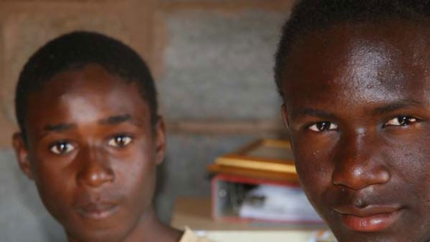 Zimbabwean refugees Michael,16, and Memory, 17, decided to stay on in the Musina shelter, in South Africa, to attend school.